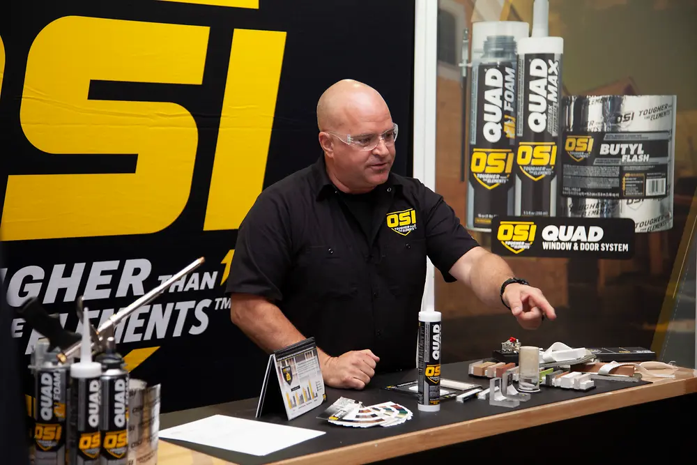 Man demonstrating OSI® QUAD® MAX sealants